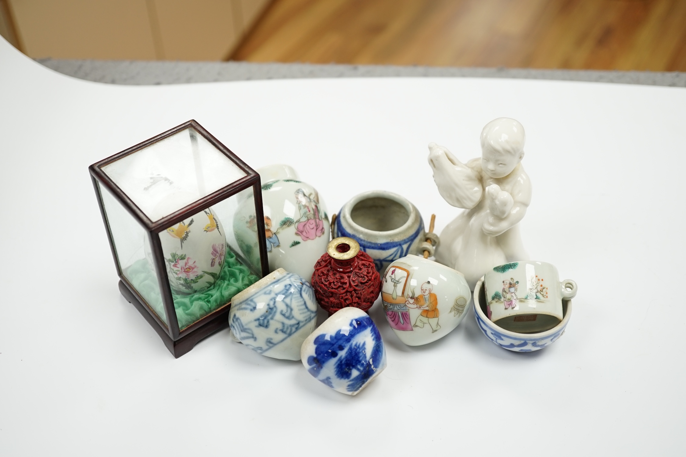 A group of small Chinese bowls, a blanc de chine figure, a cinnabar lacquer miniature vase, etc. largest 9cm high